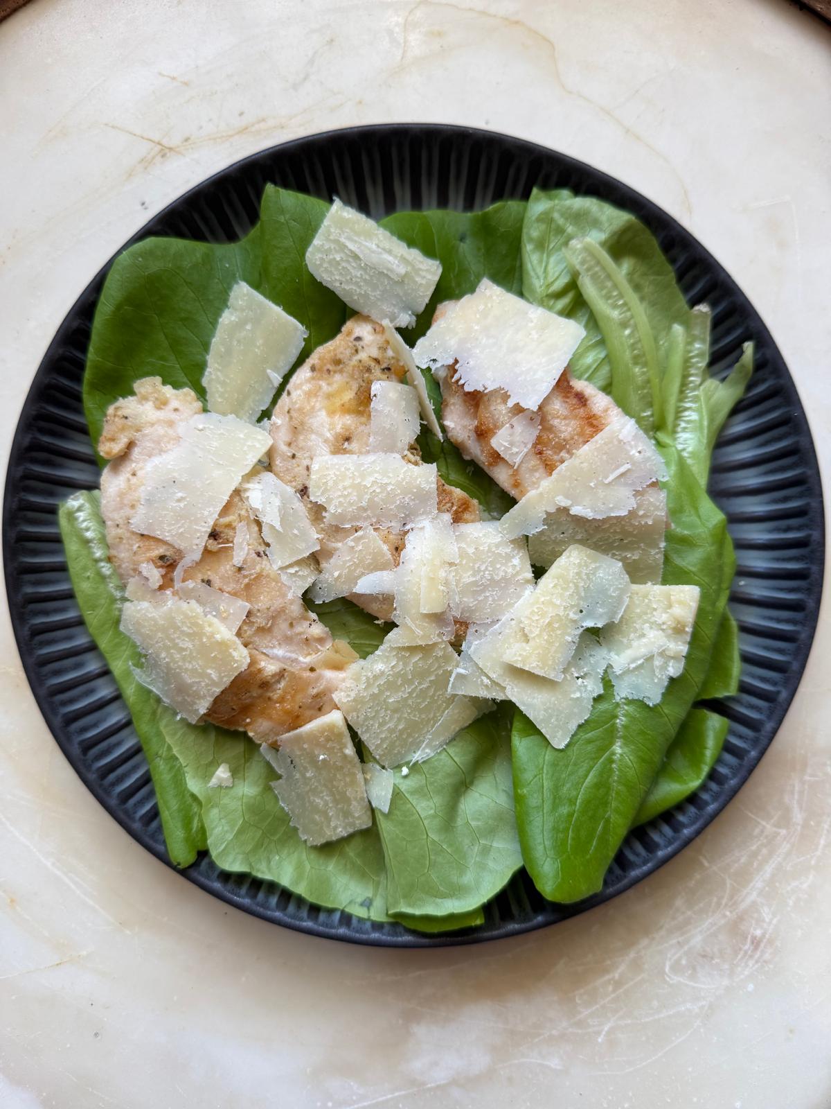 Salad with shaved Santa Marta Parmigiano Reggiano and grilled chicken