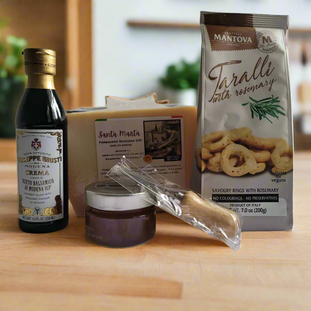 Gift Basket with real parmesan cheese, balsamic vinegar, italian honey, taralli crackers, and a parmigiano reggiano knife