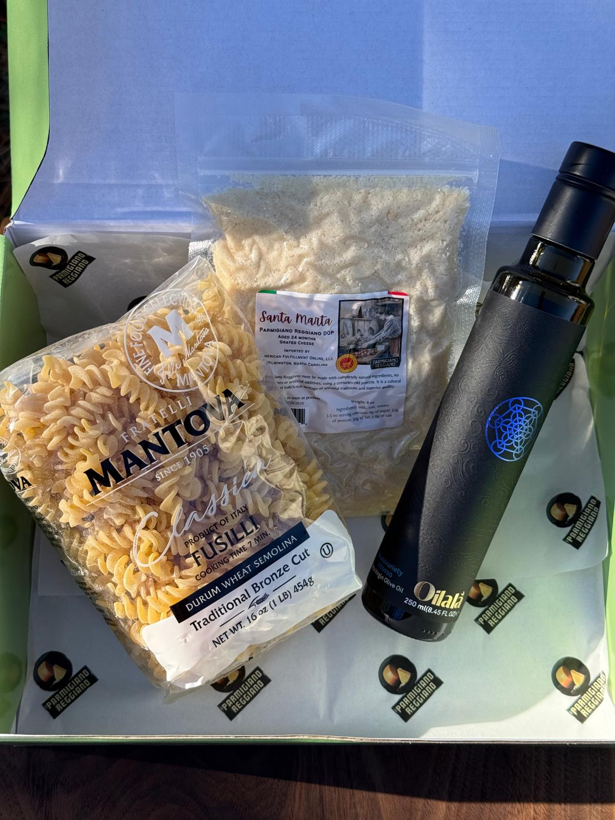 Gift basket with short pasta, intense olive oil and grated Parmigiano Reggiano